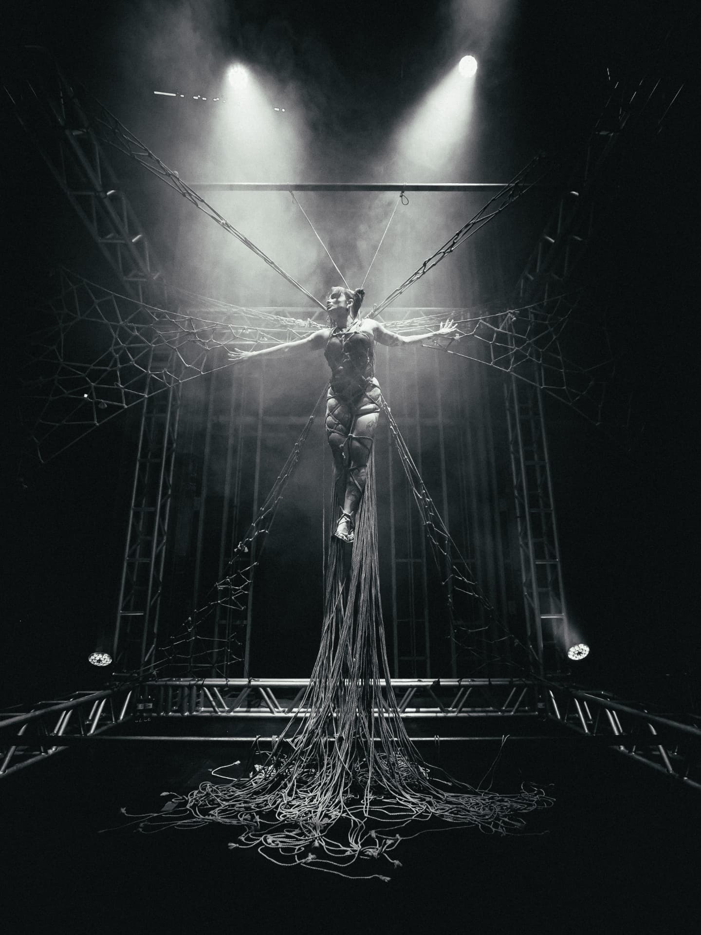 Suspended rope performance in black and white